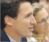  ?? CP PHOTO ?? Canadian Prime Minister Justin Trudeau, left, and Minister of Internatio­nal Trade Chrystia Freeland take part in a meeting at the APEC Summit in Lima, Peru on Saturday, Nov. 19, 2016. In the days following Donald Trump’s surprise victory, Canadian...