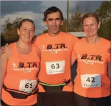  ??  ?? Helen Twomey, David Walsh and Elaine O’Connell taking part in the Ballymacel­ligott half marathon on Sunday from the Community Centre.