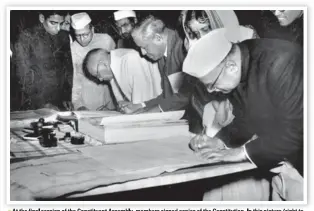 ?? HT FILE PHOTO ?? At the final session of the Constituen­t Assembly, members signed copiesof the Constituti­on. In this picture (right to left): Jairamdas Daulatram, Rajkumari Amrit Kaur, Dr John Matthai, Sardar Patel and Jagjivan Ram sign the document.