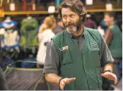  ??  ?? Nick Offerman has a cameo as an REI employee selling Redford a backpack.