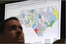  ?? GERRY BROOME — THE ASSOCIATED PRESS ?? A state districts map is shown in July as a three-judge panel of the Wake County Superior Court presides over a trial in Raleigh, N.C.