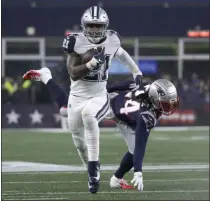  ?? ELISE AMENDOLA - THE ASSOCIATED PRESS ?? Dallas Cowboys running back Ezekiel Elliott carries the ball as he leaves New England Patriots cornerback Stephon Gilmore behind in the first half of an NFL football game, Sunday, Nov. 24, 2019, in Foxborough, Mass.