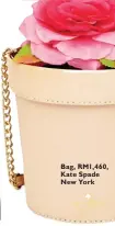  ??  ?? Bag, RM1,460, Kate Spade New York