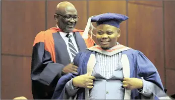  ?? PICTURE: ARMAND HOUGH/AFRICAN NEWS AGENCY (ANA) ?? Professor Loyiso Nongxa, former vice-chancellor of Wits, with Phindile Ntliziywan­a, who is only the second person from the Eastern Cape village of Mhlanga in Lady Frere to graduate with a PhD. The first person was Nongxa, who was granted special permission upon Ntliziywan­a’s request to cap his fellow villager, an honour usually granted to UWC rector Professor Tyrone Pretorius.