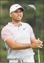  ?? Seth Wenig / Associated Press ?? Jason Day reacts after playing his shot from the sixth tee Friday.