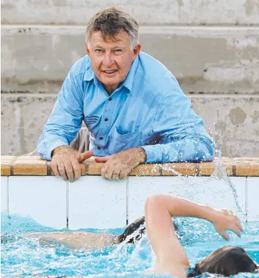  ??  ?? Coach Laurie Lawrence; Duncan Armstrong bites his gold medal at the 1988 Seoul Olympic Games (top right); and winning the 200m freestyle.