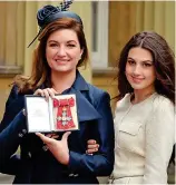  ??  ?? Celebrity mother: With Baroness Brady as she received a CBE in 2014