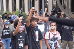  ?? NICK OZA/THE REPUBLIC ?? People of all ages attend the rally against police killings at Cesar Chavez Plaza outside Phoenix City Hall in downtown Phoenix on Thursday.