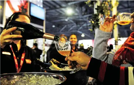  ?? Picture: David Ritchie/African News Agency (ANA) ?? PARTY STARTER: The TOPS at SPAR Wine Show has quickly risen to become South Africa’s favourite consumer wine event. The “WINEderlan­d” show, presented by the Cape Times, runs from July 12-14 at the Sun Exhibits area at GrandWest.