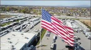  ?? CHANGE.ORG ?? Gander RV flies a 40-foot by 80-foot flag over its sales lot in Statesvill­e, N.C.