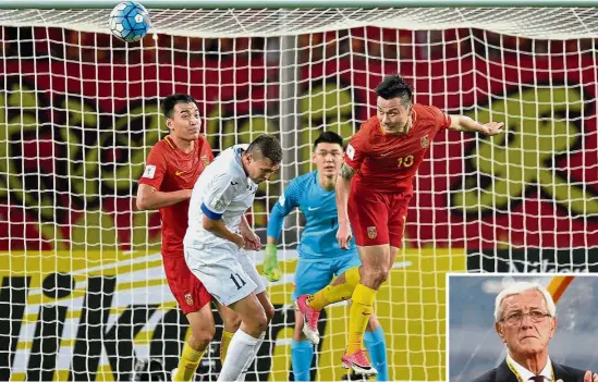  ?? — AFP ?? Keeping hopes alive: China’s Zheng Zhi (right) heading the ball away from Uzbekistan’s Igor Sergeev during the World Cup Asian qualifying match at the Wuhan Sports Centre Stadium on Aug 31. China won 1- 0. Right: China coach Marcelo Lippi.