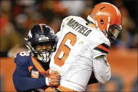  ?? MATTHEW STOCKMAN / GETTY IMAGES ?? Linebacker Von Miller sacks Browns rookie Baker Mayfield to surpass Simon Fletcher as the Broncos’ all-time sack leader earlier this month.