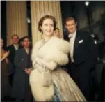  ?? ROBERT VIGLASKY — NETFLIX VIA AP ?? This image released by Netflix shows Claire Foy, center, and Matt Smith, right, in a scene from “The Crown.”