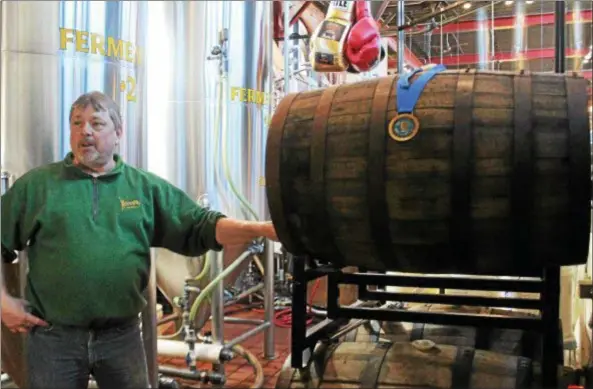  ?? TAWANA ROBERTS — THE NEWS-HERALD ?? Willoughby Brewing Company brews ales, porters, hoppy beer and German beer, according to Brewmaster Rick Seibt.