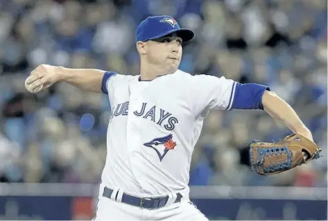  ?? CANADIAN PRESS FILES ?? Toronto Blue Jays pitcher Aaron Sanchez throws against the Baltimore Orioles in a game on April 14 in Toronto. The pitcher felt good after a bullpen session Sunday and hopes to return soon to a depleted Toronto rotation.