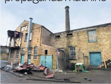  ??  ?? TROUBLE AT MILL Derelict building is base of organisati­on combatting Russian disinforma­tion