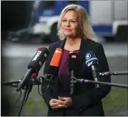  ?? LARS KLEMMER/DPA VIA AP ?? Nancy Faeser, Federal Minister of the Interior and Home Affairs talks to members of the press in Emden, Germany, Saturday Nov. 26, 2022.