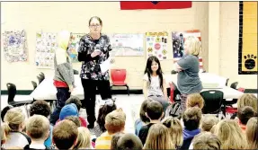  ?? Photo submitted ?? School nurse Wendy Catron is pictured with Aiden Webb (left), Angelina Martinez and Shyanne Marvin.