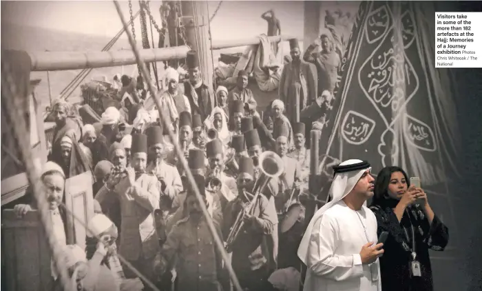  ?? Photos Chris Whiteoak / The National ?? Visitors take in some of the more than 182 artefacts at the Hajj: Memories of a Journey exhibition