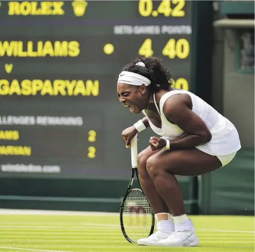  ?? LEON NEAL / AFP / Gett
y Imag
es ?? American Serena Williams celebrates her first set comeback against Russia’s Margarita Gasparyan during their women’s singles first-round match on the first day of Wimbledon on Monday at the All-England Club.