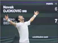  ?? ALBERTO PEZZALI — THE ASSOCIATED PRESS ?? Novak Djokovic celebrates his victory over Matteo Berrettini in the men’s singles final at Wimbledon on Sunday.