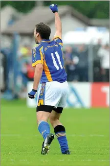  ??  ?? Tony Hannon punches the air as his late 45 sails between the posts during the qualifier clash with Down in Aughrim in 2009.