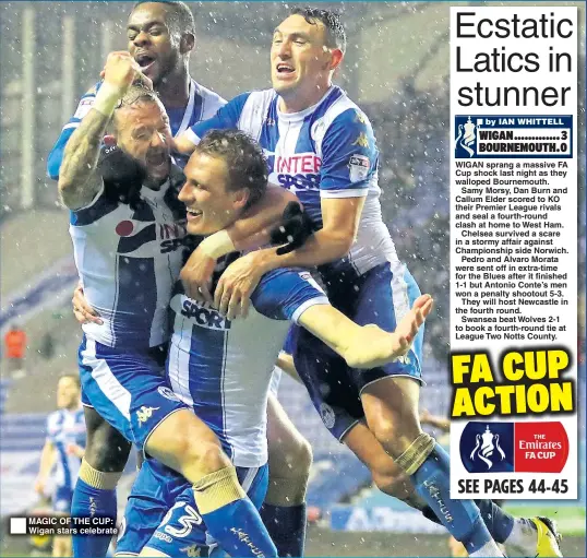  ??  ?? MAGIC OF THE CUP: Wigan stars celebrate