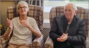  ?? ?? LOVE TO MOVE: Deangate Care Home residents Pamela Duckworth, 79, and Paul Cook, 78, enjoying the gymnastics session.