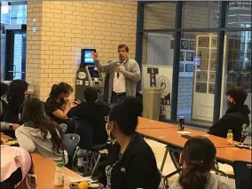  ?? ?? Lorain High School coach Dave McFarland gestures as he addresses 100Lorain High School students gathered on Sept. 24for a breakfast kickoff of oneLHS.