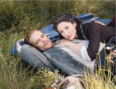  ?? COURTESY OF STARZ ?? Sam Heughan and Caitriona Balfe in a scene from “Outlander.”