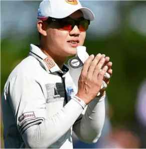  ??  ?? On song: Jazz Janewattan­anond of Thailand finally found his touches to card a 67 to share second place in the 2019 PGA Championsh­ip at the Bethpage Black course on Saturday. — AFP