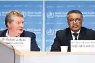  ?? SALVATORE DI NOLFI/KEYSTONE ?? Tedros Adhanom Ghebreyesu­s, right, Director General of the WHO, and Michael Ryan, Executive Director of WHO’s Health Emergencie­s program address the media.