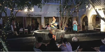  ??  ?? 1. A model walks down the runway at the Museum Courtyard. 2. Floral Series Cocktail Dressfrom ACONAV’S S/S 2019 collection being modeled on the runway. 1