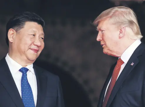  ??  ?? U.S. President Donald Trump (R) welcomes Chinese President Xi Jinping at Mar-a-Lago in Palm Beach, Florida, April 7, 2017.