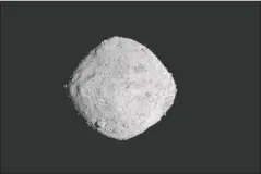  ?? The Associated Press ?? ASTEROID BENNU: This Nov. 16 image provided by NASA shows the asteroid Bennu. After a two-year chase, a NASA spacecraft has arrived at the ancient asteroid Bennu, its first visitor in billions of years. The robotic explorer OsirisRex pulled within 12 miles (19 kilometers) of the diamond-shaped space rock Monday. The image, which was taken by the PolyCam camera, shows Bennu at 300 pixels and has been stretched to increase contrast between highlights and shadows.