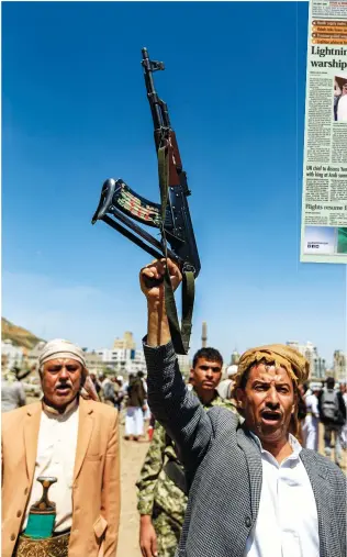  ?? AFP ?? A Yemeni man chants as he holds up a assault rifle in the Houthi rebel-held capital Sanaa on Sept. 21, 2019.