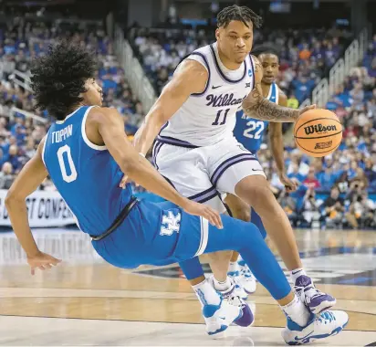  ?? NBA DRAFT CHRIS CARLSON/AP ?? Kansas State forward Keyontae Johnson, right, shown playing against Kentucky during the NCAA Tournament, was the 50th overall selection by the Oklahoma City Thunder in Thursday night’s NBA draft.