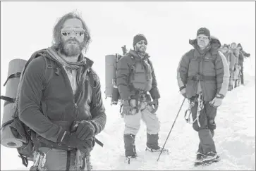  ?? Jasin Boland
Associated Press ?? JAKE GYLLENHAAL, left, Michael Kelly, Josh Brolin in “Everest,” which Jon Krakauer calls “total bull.”