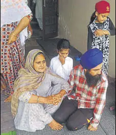  ?? HT PHOTO ?? Family members of Sikh activist Gurbaksh Singh Khalsa.