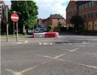  ?? Credit: James Aldridge, Local Democracy Reporter ?? STAYING?: The cycle lane in Sidmouth Street, Reading. Barriers prevent cars from using the lane.