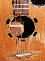  ??  ?? Jeremy Blick’s Takamine EN10C bears the marks of its “well played and well loved” existence thus far