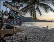  ?? ADAM DEAN — THE NEW YORK TIMES ?? Visitors at Kamala Beach in Phuket, Thailand, on March 1, 2022. Season 3of the hit HBO series “The White Lotus” is being shot in the lush Southeast Asian country, which is betting financial incentives given to the production will pay off in increased tourism numbers.