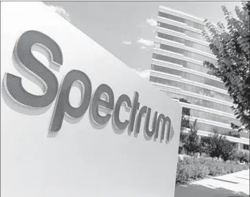  ?? Kristoffer Tripplaar Sipa USA via AP ?? SPECTRUM, which is owned by Charter Communicat­ions, will increase the monthly fee for its set-top boxes from $6.99 to $7.50 in November. Above, the cable and internet provider’s facility in Greenwood Village, Colo.