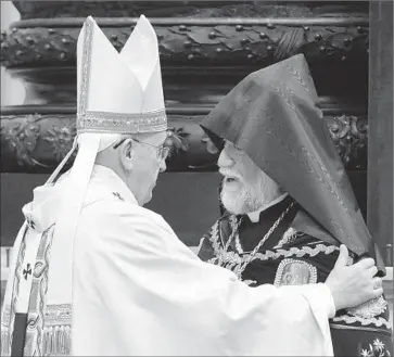  ?? Andreas Solaro AFP/Getty Images ?? THE POPE and Aram I, a top Armenian church leader, at St. Peter’s Basilica. Francis said the slaughter by Ottoman Turks of as many as 1.5 million Armenians was “the first genocide of the 20th century.”