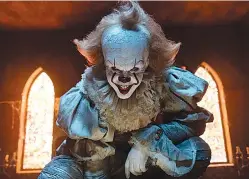  ?? Brooke Palmer/Warner Bros. Pictures via AP ??    This image released by Warner Bros. Pictures shows Bill Skarsgard as the evil clown Pennywise in a scene from the film “It,” based on the book by Stephen King.