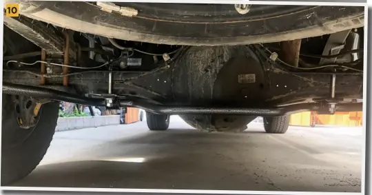  ??  ?? 10 With the sway bar properly centered, check clearances to make sure nothing is interferin­g with other components of the vehicle and no cables are being pinched. Tighten U-bolts to 50 lbft. Double nut the axle U-bolts.