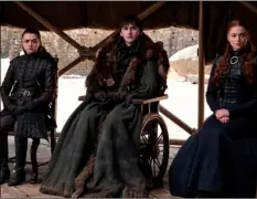  ??  ?? This image released by HBO shows from left to right Maisie Williams, Isaac Hempstead Wright and Sophie Turner in a scene from the final episode of “Game of Thrones,” that aired on Sunday. HBO VIA AP