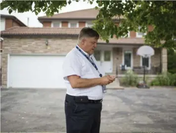  ?? CARLOS OSORIO/TORONTO STAR ?? Councillor Jim Karygianni­s stands in front of 54 Canongate Trail, which once operated illegally as a rooming house.