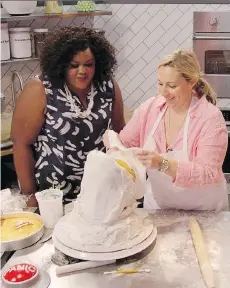  ?? NETFLIX ?? Nailed It!’s Nicole Byer watches a baketestan­t work on … a cake?