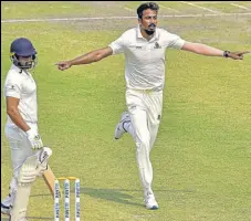  ?? PTI ?? Bengal’s Ishan Porel celebrates dismissing Karnataka skipper Karun Nair at Eden Gardens, Sunday.